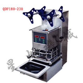 塑料盒自動(dòng)灌裝封口機(jī)(全不銹鋼)