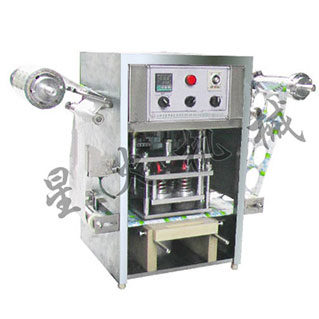 塑料盒自動(dòng)灌裝封口機(jī)
